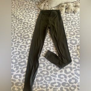 Dark green lululemon leggings.